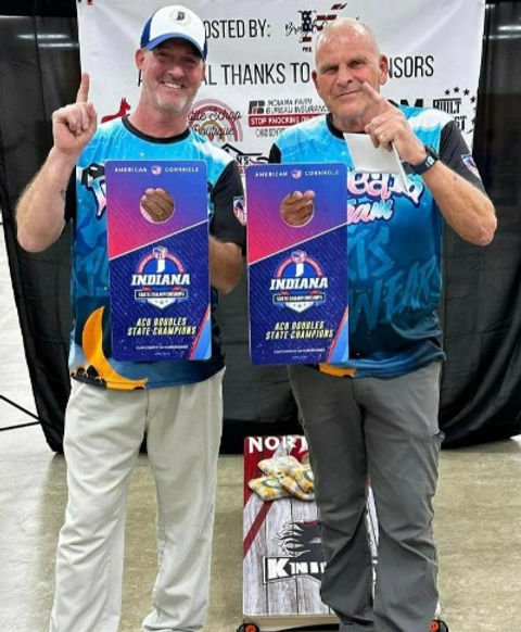 Cornhole Players displaying State Champions