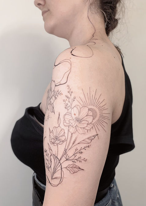 Tatouage fleurs fin suisse