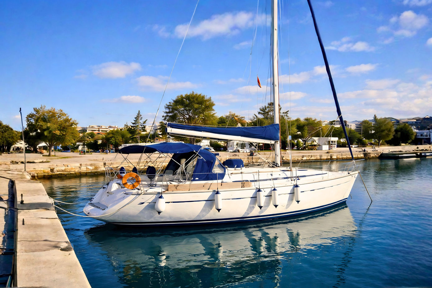 Spanaki Bavaria 41 sailing yacht side view at harbor with mast and deck visible