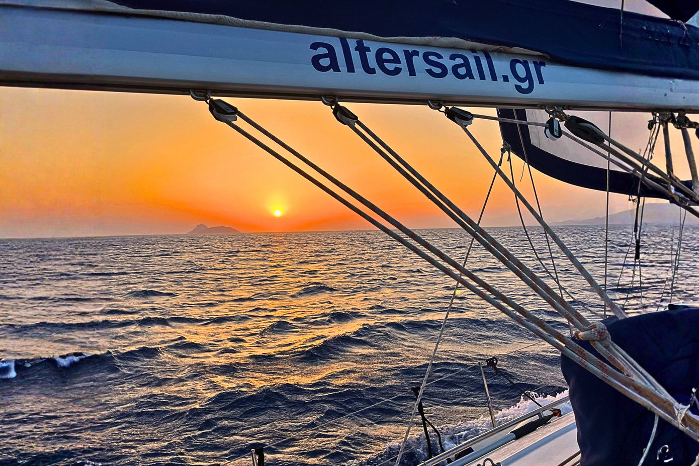 Sunset view during Cretan culinary sailing experience near Dia Island in Crete