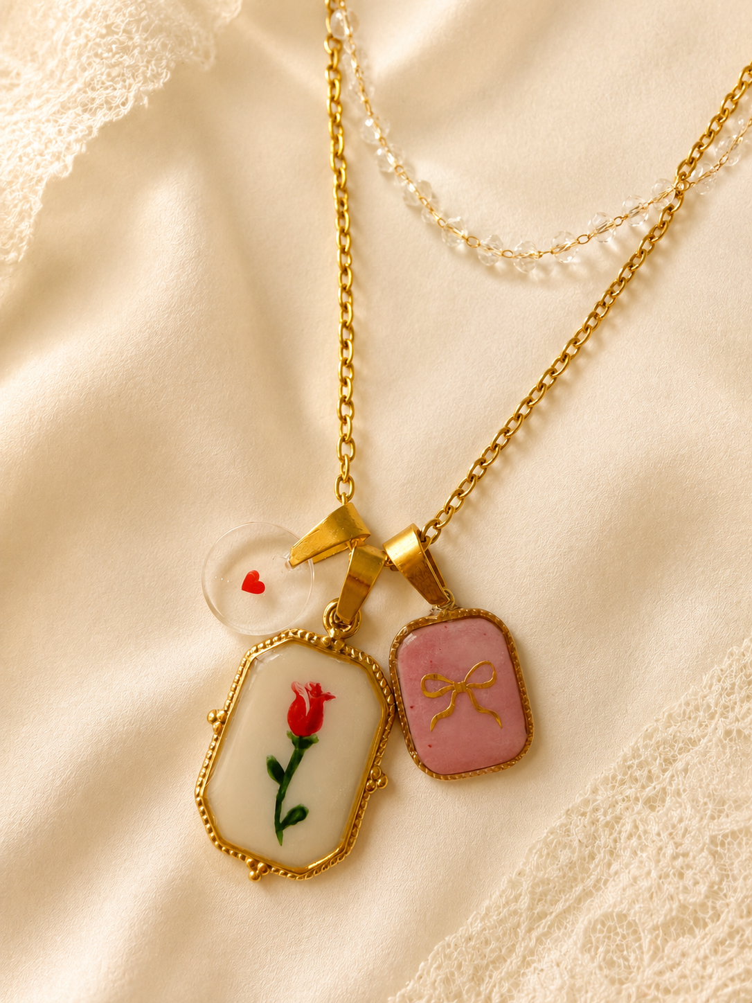 Collier Rosebud et Sweet Bow (+Breloque coeur offerte) - Perles Transparentes