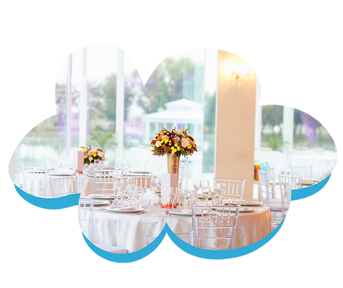 beautifully decorated table with flower arrangements for an event