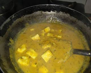 Paneer Butter Masala in the kadai being cooked