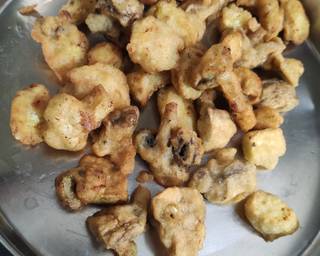 Fried baby corn and mushroom ready for being mixed with sauce