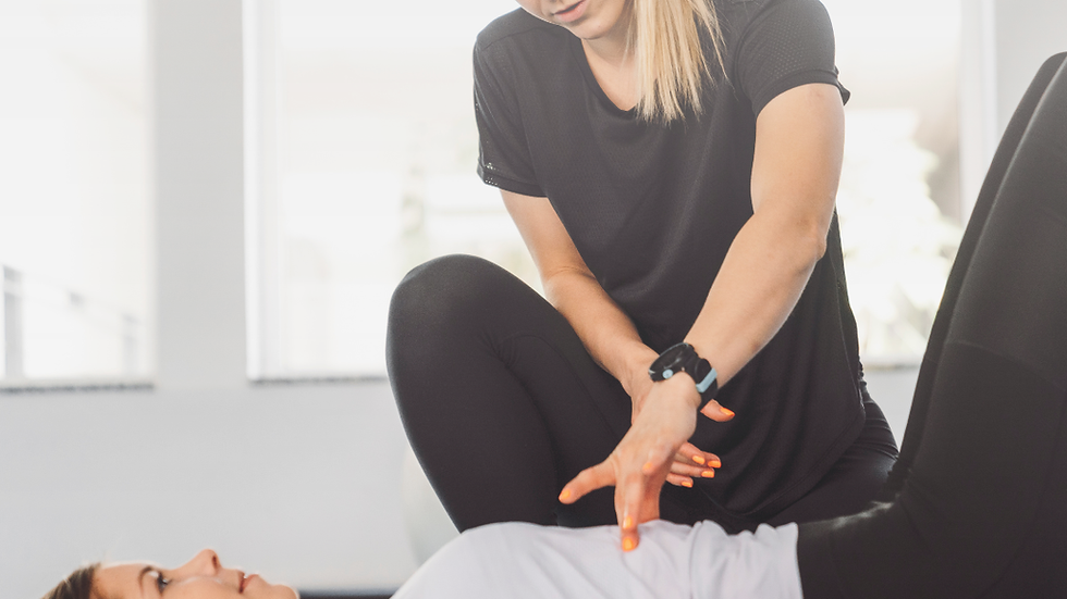 High angle view of a rehabilitation class with participants practicing back strengthening exercises