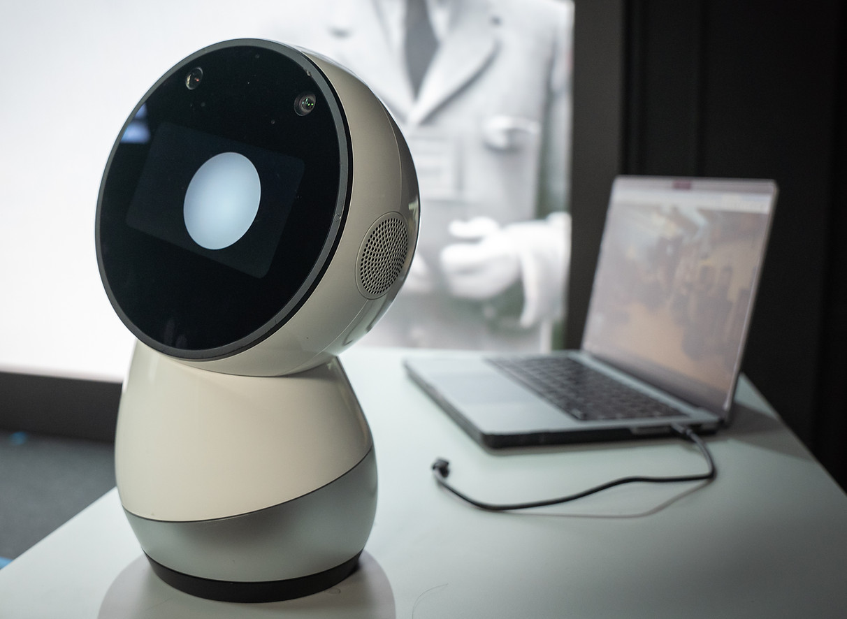 Jibo sits on a desk at the XR-Studio.JPEG