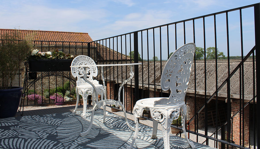 Hideout Loft Mallard Grange B alcony Dining_edited.jpg