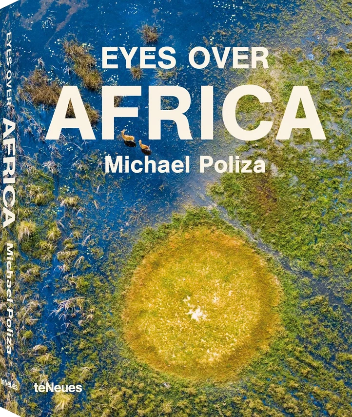 Eyes over Africa by Michael Poliza, teNeues: cover with an aerial view of two lechwe crossing a flooded wetland