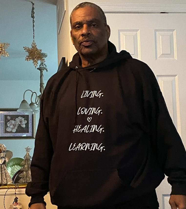 Thumbnail: "Living Loving Healing Learning" Hooded Sweatshirt