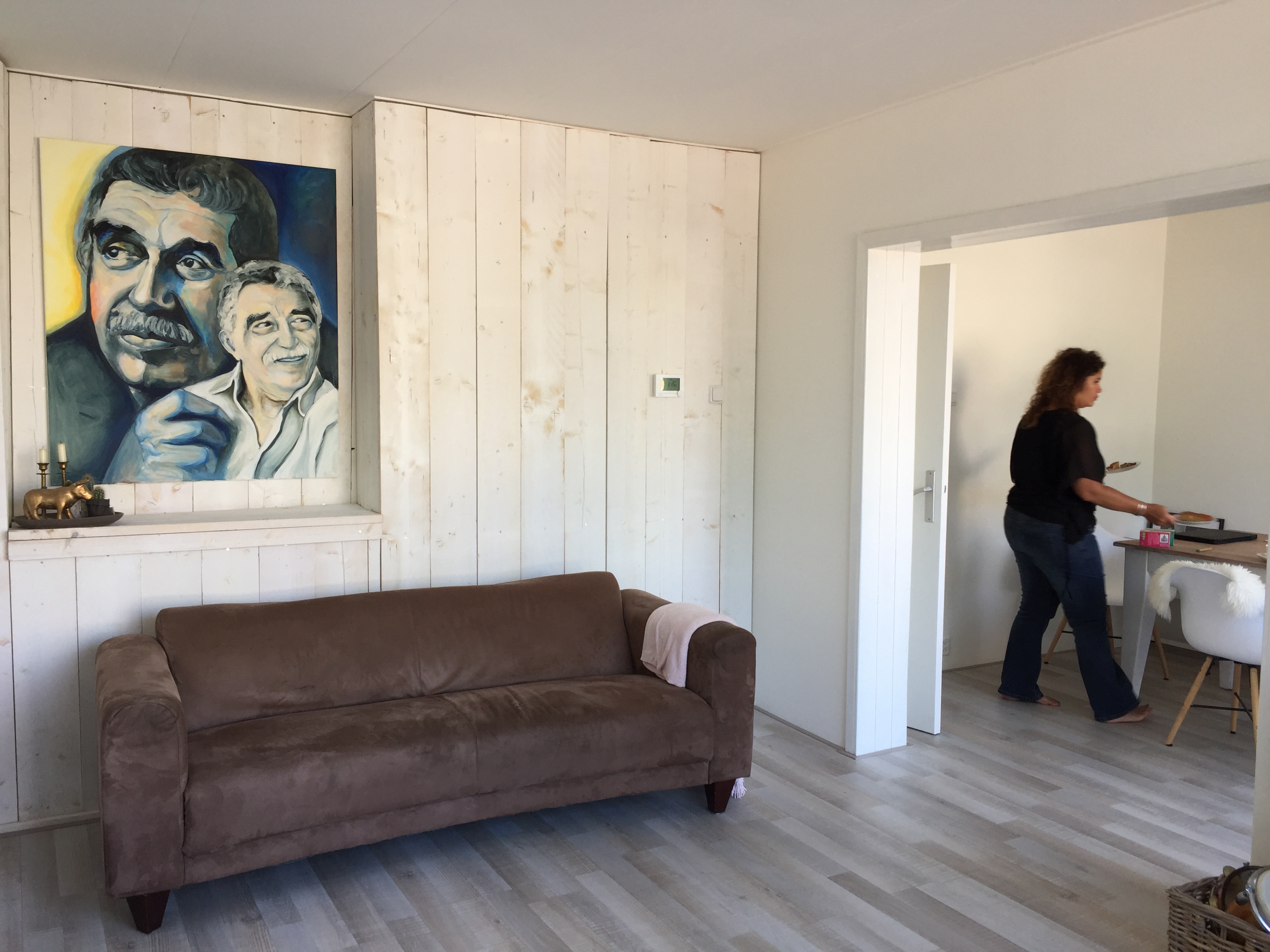 Schilderij bij klant aan de muur