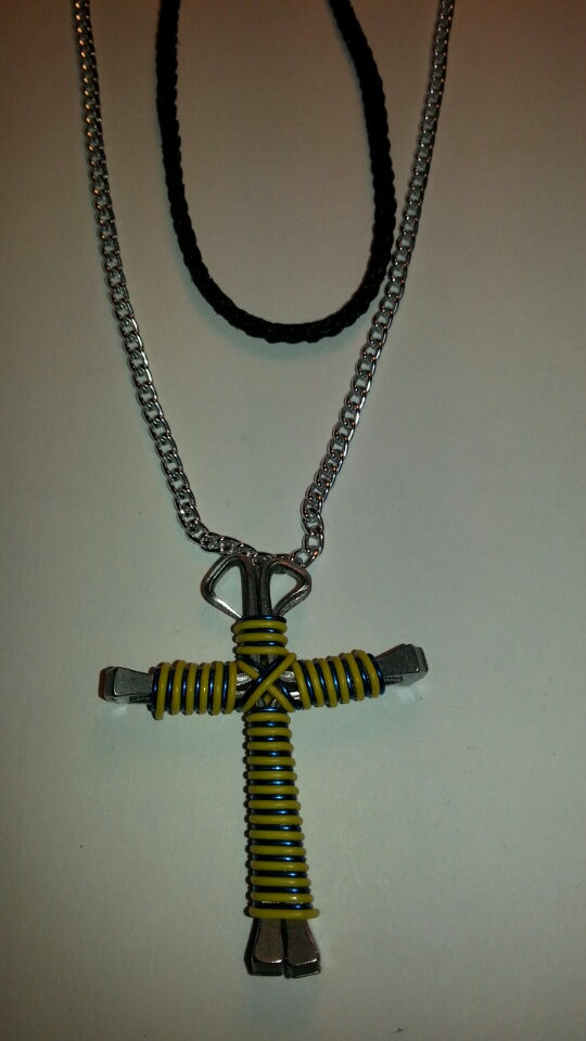 Thumbnail: Candy Cane Colored Wire Wrapped Horseshoe Nail Cross Necklaces J