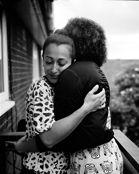 Portrait of a mother embracing her daughter | love, sex and relationships