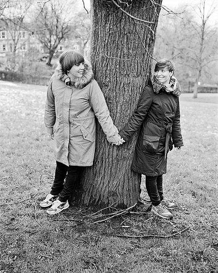 Portrait of a married couple playing in a park in London | love, sex and relationships