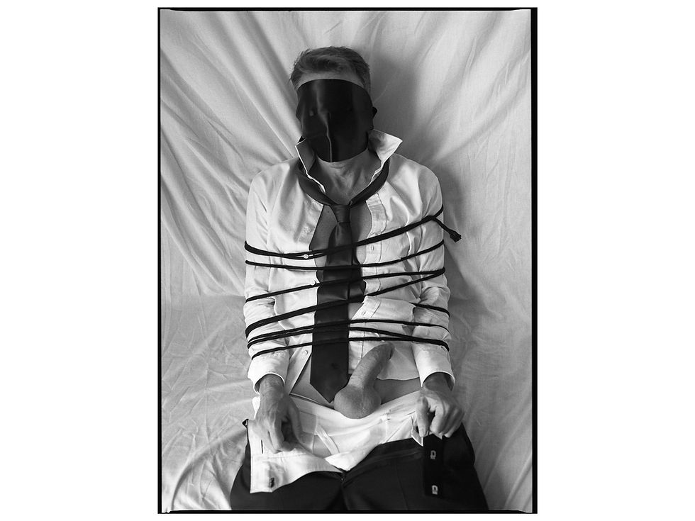 Black and white photo titled "The Businessman" from I am your mirror, limited edition by Loredana Denicola.