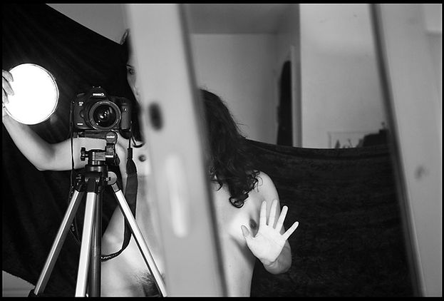 Self-portrait of a naked woman, distorted in the mirror | I am your mirror