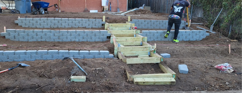 Terraced backyard retaining wall installation in Northeast Heights, ABQ