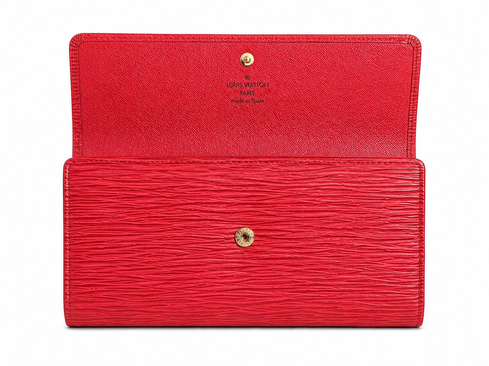 Thumbnail: Open red Louis Vuitton wallet with 'LOUIS VUITTON PARIS made in Spain'