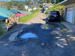 Rosenberg Loop Pothole.jpg