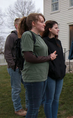 Young Single Adult females listen to a historical tour