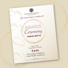 Invite that has title in the center with a golden brushed circle surrounding it.