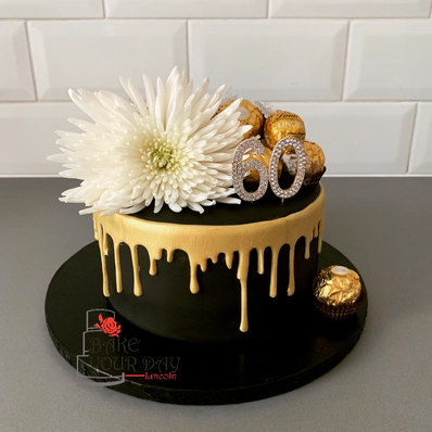 Black and Gold Dripcake.jpeg