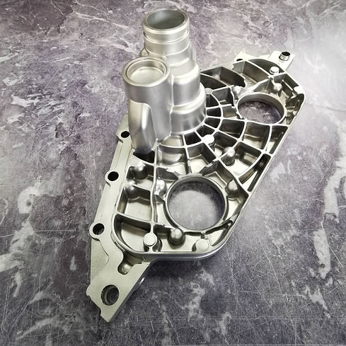 A clean engine part which is used as an example of the finish achieved by vapour blasting (aka hydroblasting or aquablasting). There is no build up or dirt on the part.