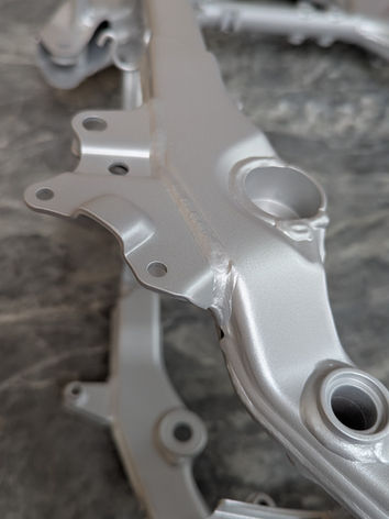 RAL 9006 White Aluminum powder coat motorcycle frame by Restoren