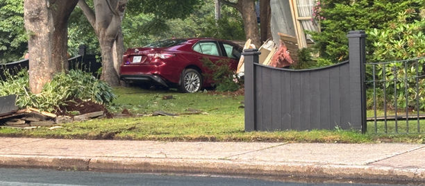 No Serious Injuries After Vehicle Hits Car Then Slams Into St. John’s Home