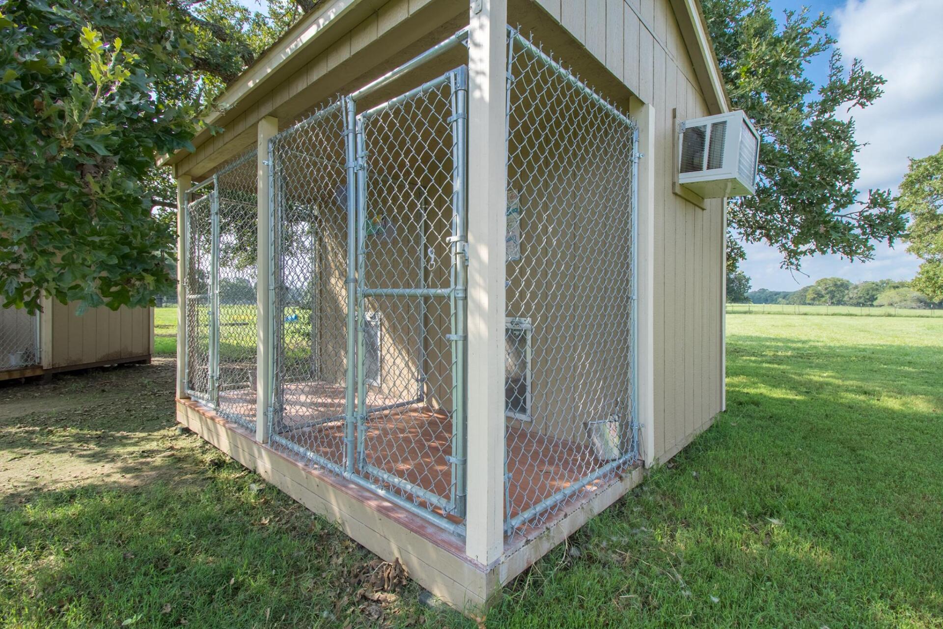 Climate-controlled dog boarding bungalows in Bastrop, TX