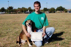 Sammie and her owner with an advanced obedience certificate