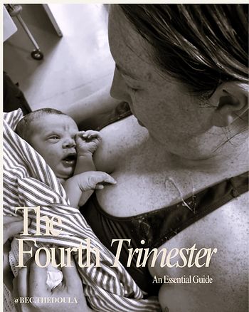 Mother looks at newborn after birth.