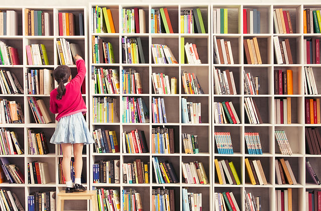 Girl Reaching Books