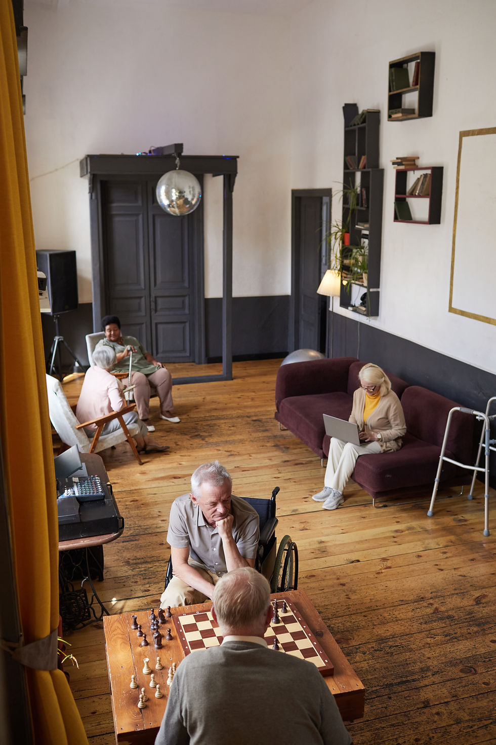 vertical-wide-angle-shot-senior-people-enjoying-activities-nursing-home-copy-space.jpg