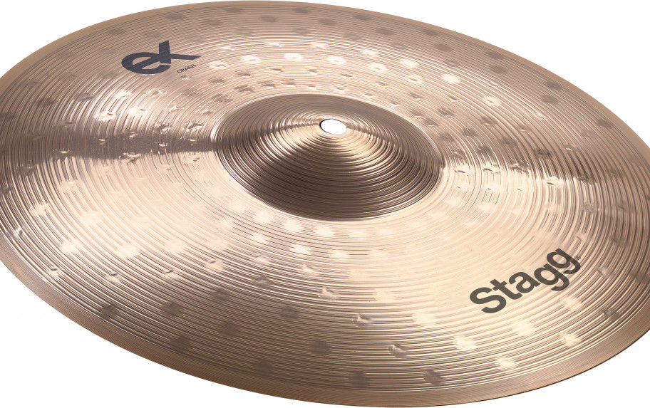 Close-up of a shiny drum cymbal with the word "Stage" on it.