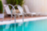 chairs by pool