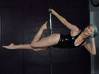"She takes no shit and is someone who lifts people up"; Vestavia's Pole Mother