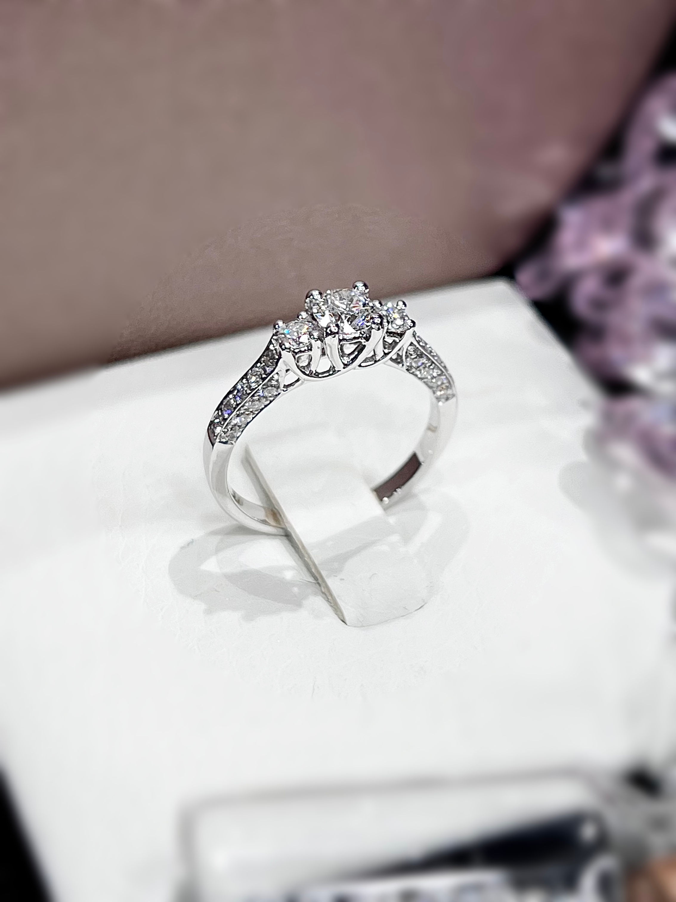 Three-stone diamond ring 0.75 TCW. (GIA)