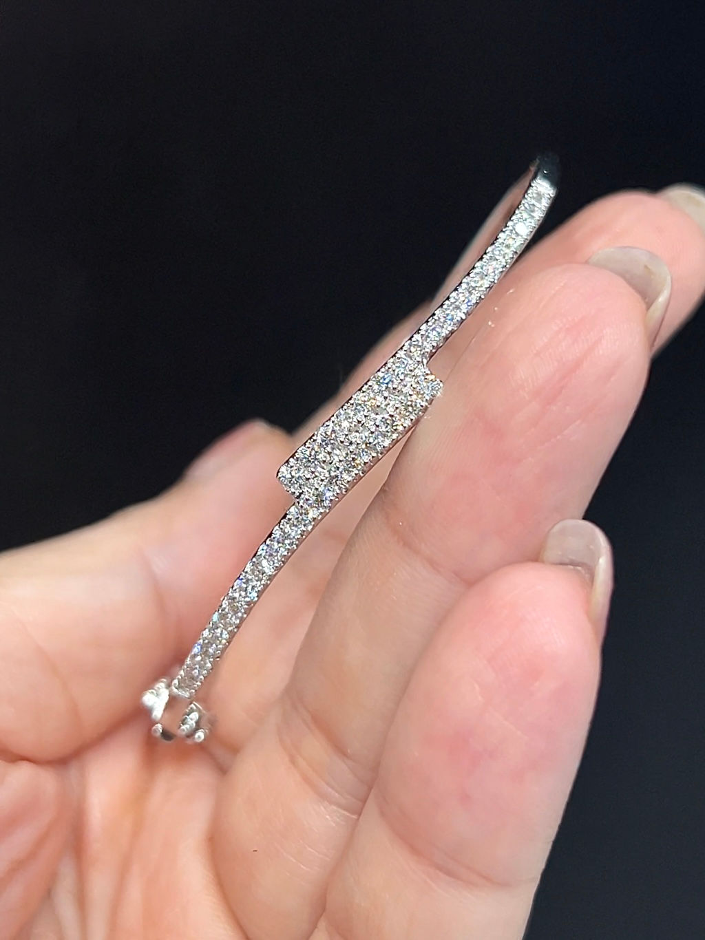 Wave design diamond bangle 0.78 TCW.