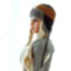 Full-size adult doll Aurora in white sports bra and pink shorts, side glancing with a sultry expression