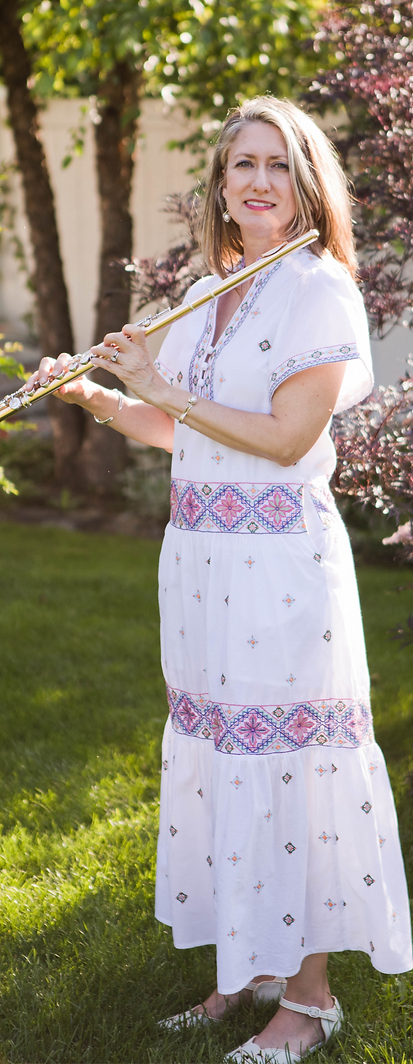 Holly holding her flute