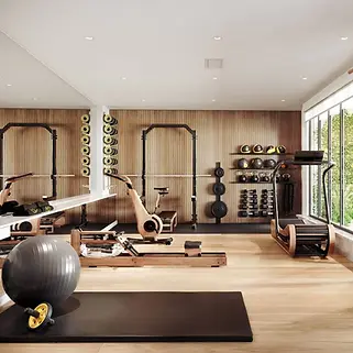 vertical_wood_slat_wall_in_home_gym_with_hardwood_floors.webp