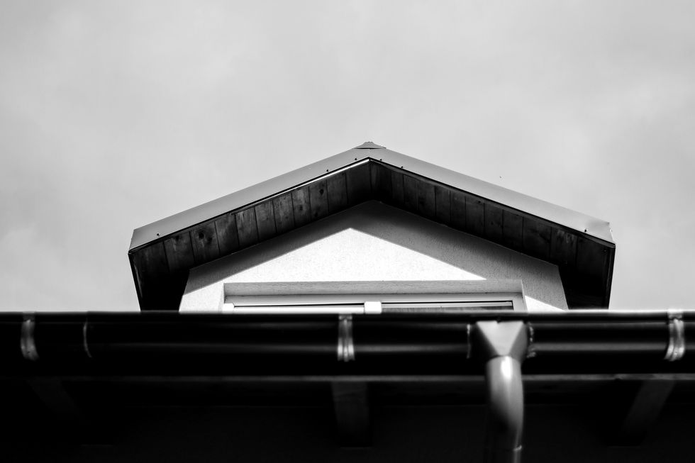brown wooden roof under white sky during daytime_edited.jpg