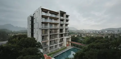 Aerial view of Hyparc Hangdong condominium showing building massing, pool amenity, landscape integration, and surrounding context.