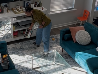 Solo mom resetting her living room during her evening routine