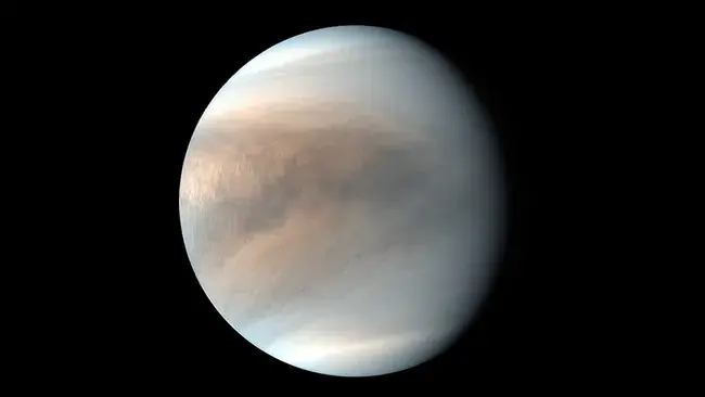 Las marcas oscuras en la atmósfera de Venus, vistas aquí por la nave espacial japonesa Akatsuki, provienen de una sustancia que absorbe los rayos UV. (Crédito de la imagen: JAXA)