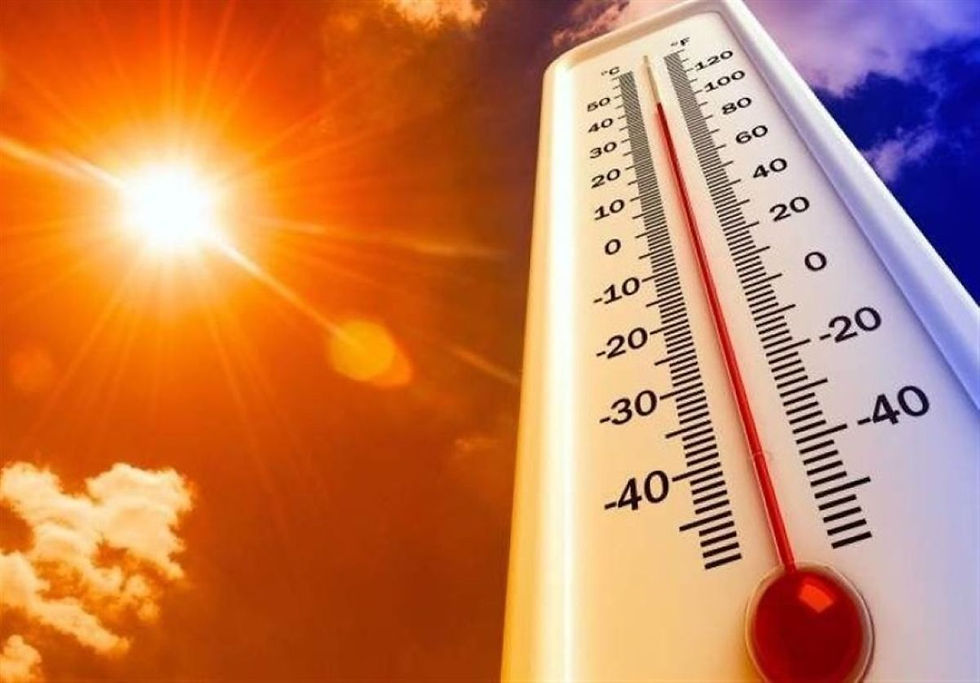 A hot summer sun in the background with a large thermometer in the foreground
