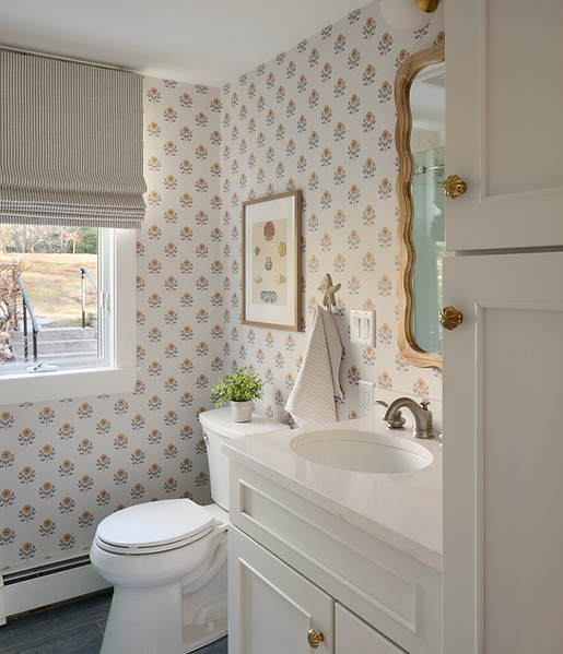 Full bathroom with walk-in shower at Lake Shore Cottage