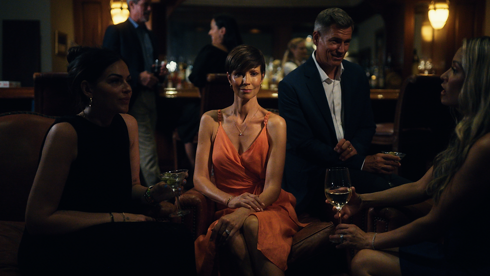 Guests gather in a stylish, warmly lit lounge, capturing curated lifestyle moments, brand storytelling, and editorial visual storytelling.