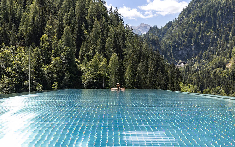 Hotel Lürzerhof rooftop infinity pool overlooking the Austrian Alps