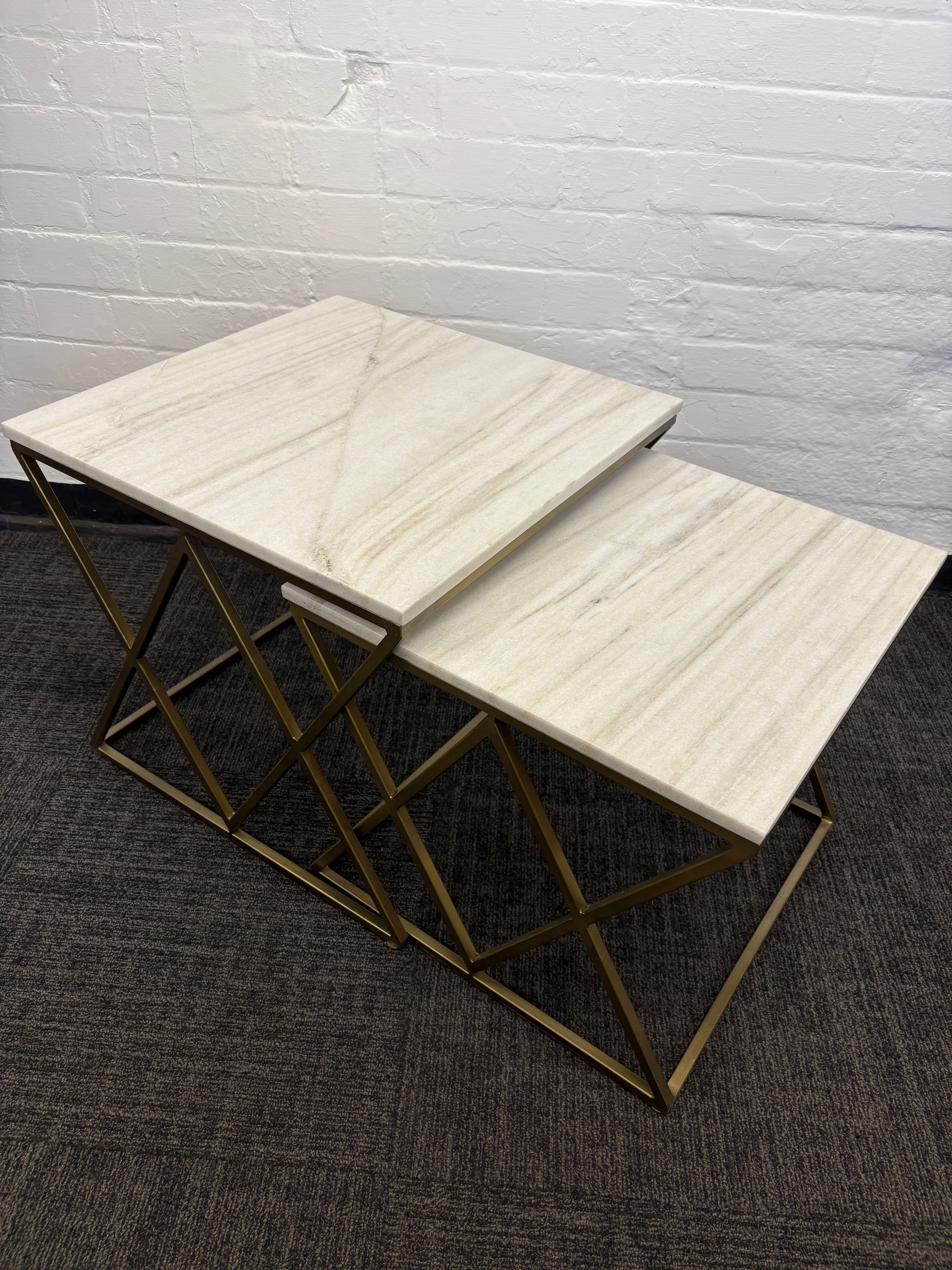 Nest of two marble tables